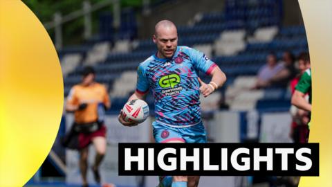 Liam Marshall runs in a try for Wigan at Huddersfield