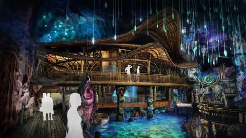 An example image of the winning ride in a fantasy underwater world. The design features a cave-looking ceiling with crystals hanging from it, blue-green waters and a wooden building with a wavy rooftop. Silhouettes of people are positioned across it to recreate what the experience for riders would be like.