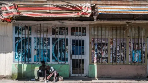 AFP Shops with bars over the windows