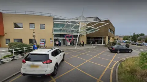 Google Google StreetView image of the entrance to West Middlesex University Hospital.