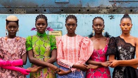 Five models wearing African clothing