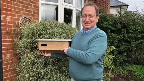 BBC/Jon Wright Eddie Bathgate with nesting box