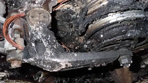 London Fire Brigade A heavily charred e-scooter motor 