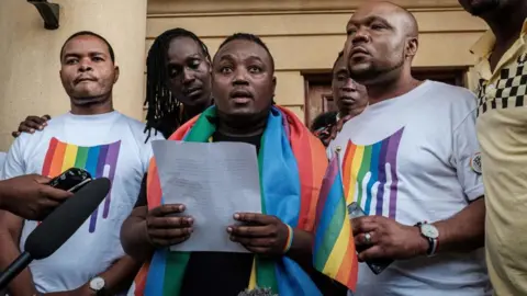 Getty Images Members and supporters of the LGBTQ community stand and give a statement - Friday 24 May 2019