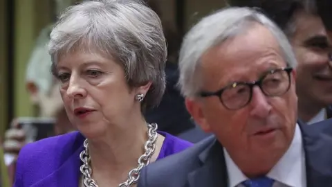 EPA Theresa May and Jean-Claude Juncker