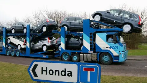 Getty Images Hondas on trucks