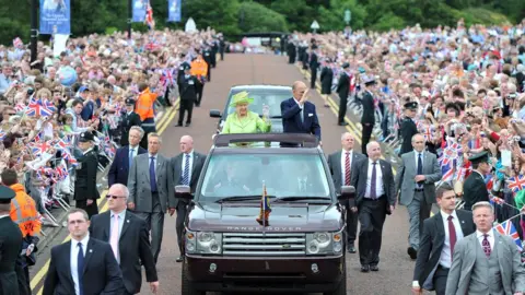 PAcamaker Thousands crowded into the grounds of Stormont to see the Royal couple in 2012
