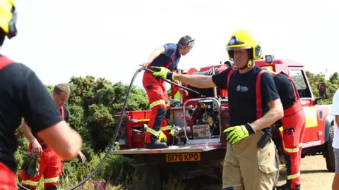 Island Echo Firefighters working at the Isle of Wight fire.