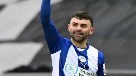Jonny Smith in action for Wigan Athletic