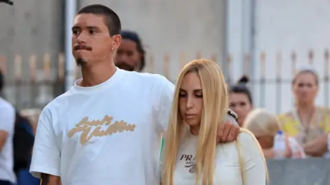 Liverpool player Darwin Nunez attends the public wake in Gondomar on Friday alongside his girlfriend Lorena Manas