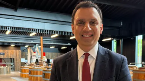 Anas Sarwar visiting a distillery in Falkirk