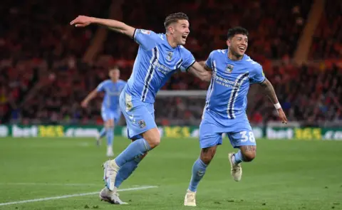 Getty Images/Stu Forster Gustavo Hamer (right) celebrating with Viktor Gyokeres after scoring