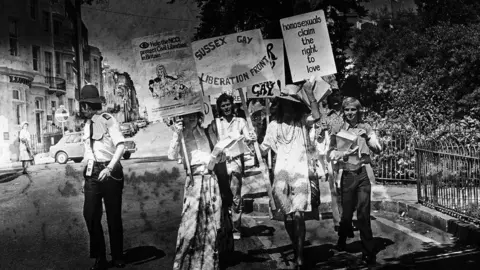 Andy Garth/Argus Photographic Archives Black and white photo of a gay Pride march