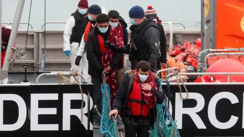 Migrants on a Border Force rescue boat