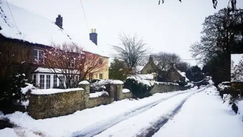 Ashley Maguire Ramsden, near Witney, under a carpet of snow