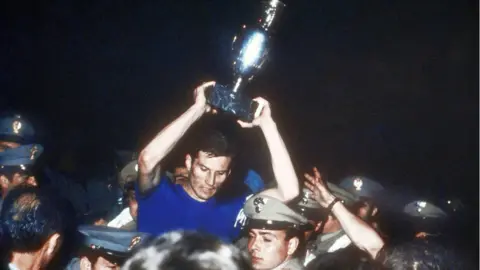 Getty Images Italy captain Giacinto Facchetti lifts the Euros trophy in 1968