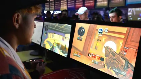 Getty Images People playing games during the Call of Duty World League Championship 2019 at Pauley Pavilion on August 16, 2019 in Los Angeles, California.