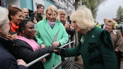 PA Media The Queen greets members of the public on the Lisburn Road in Belfast