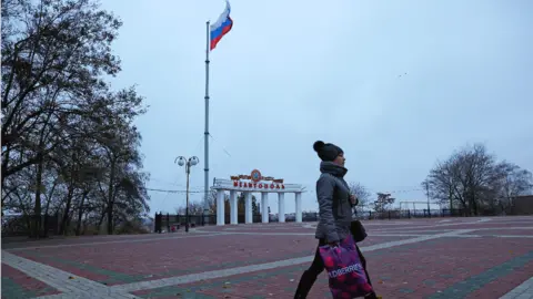 Reuters A Russian flag stands over Melitopol, a Ukrainian city occupied by Russia