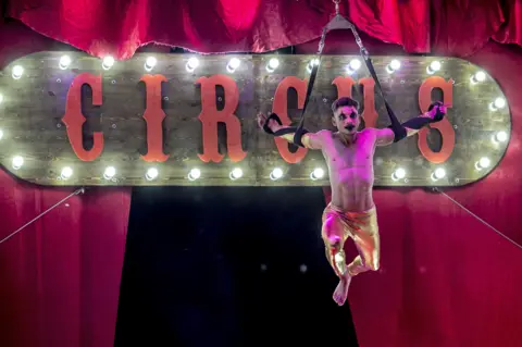 Yassine Gaidi/Getty Images A man performs at the International Circus and Street Art Festival in Tunis, Tunisia - Monday 12 June 2023