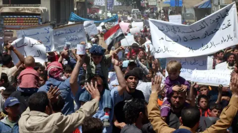 AFP Syrian anti-government protesters near the southern town of Deraa, in April, 2011