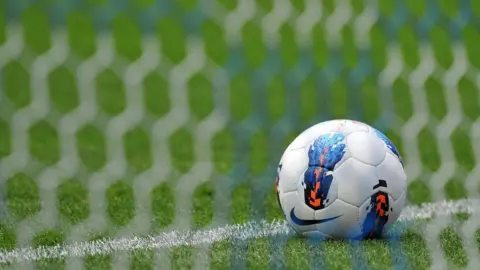 PA Media Football in net