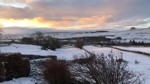 BBC Weather Watchers/Charles Dawn breaks over the snow-covered fields in County Durham