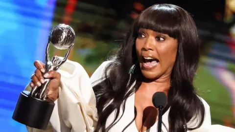 Reuters Actress Angela Bassett accepts the Entertainer of the Year award at the 54th NAACP Image Awards at the Civic Auditorium in Pasadena, California, U.S., February 25, 2023