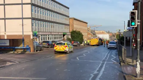 Luke Deal/BBC A police car and a fire engine can be seen responding to an incident in Bury St Edmunds