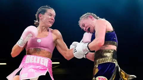 Terri Harper lands a left uppercut against Natalie Zimmerman