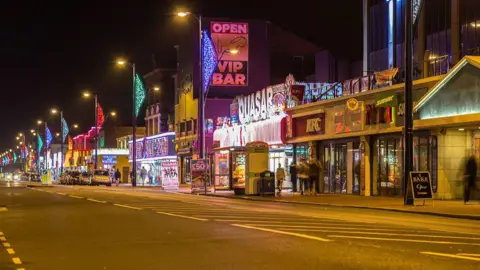 Great Yamouth seafront at night, showing restaurants and arcades