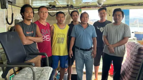 ITF The Burmese crew of the cargo ship Kokoo, which was abandoned last year. 