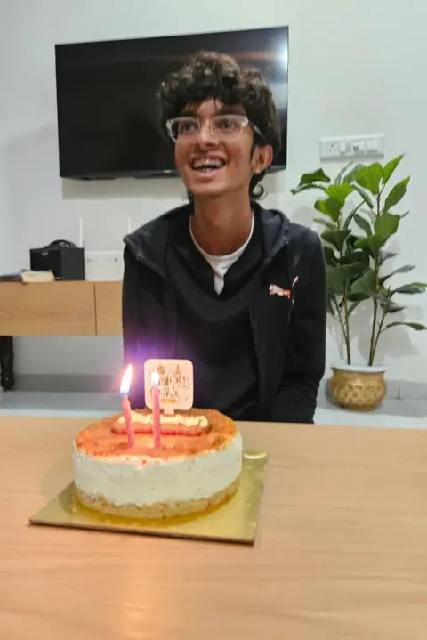 Kahaan Patel with a birthday cake