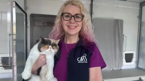 Cats Protection Diane Armer with flat faced cat