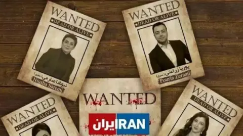 Counter Terrorism Policing Part of a poster with four pictures on it with the words Wanted, dead or alive written on them. One of the photos is of Pouria Zeraati, another is of Niusha Saremi. There are two others below them, their names are cut off by the cropping of the photo. 
