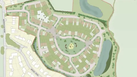 A plan of a green area with houses and roads marked on it and an area in the centre with two concentric circular roads.