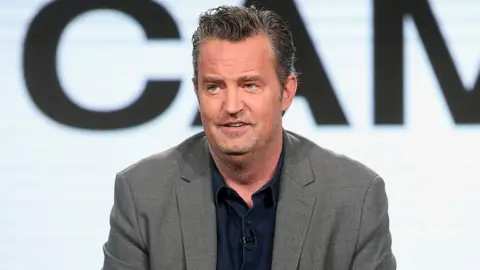 Getty Images Aktor Matthew Perry berbicara di sebuah acara pada tahun 2017