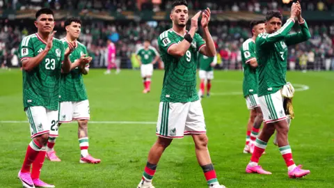 Mexico's Raul Jimenez (centre) and team-mates applaud the fans following defeat in the FIFA World Cup Round of 16 match at Mexico City Stadium, Mexico.