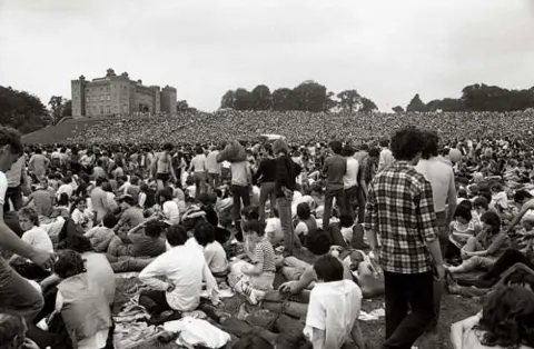 Andy Spearman Fans sit at Slane Castle during the first show in 1981