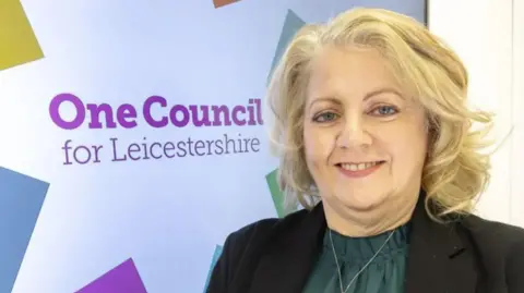 Leicestershire County Council Deborah Taylor in a green shirt and a black jacket