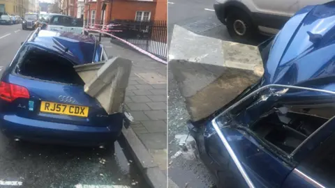 Ollie Silverton/Twitter Car hit by masonry in Storm Eleanor