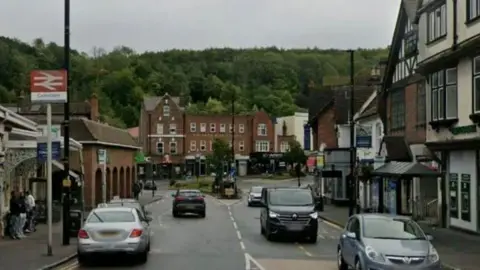 A google screen view of a main road outside Caterham train station.