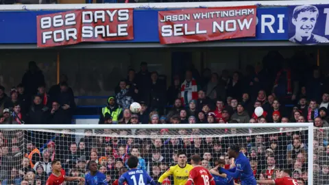 Morecambe protest banner at Chelsea