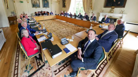 President of Ireland The Irish council of state meets in a large room - they sit around a series of rectangular tables arranged into a larger rectangle with a space in the middle