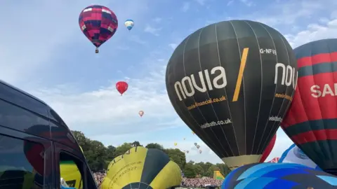 Dominic Hewitt Balloons taking off