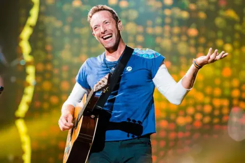 Getty Images Chris Martin of Coldplay performs live on stage at Allianz Parque on November 7, 2017 in Sao Paulo, Brazil