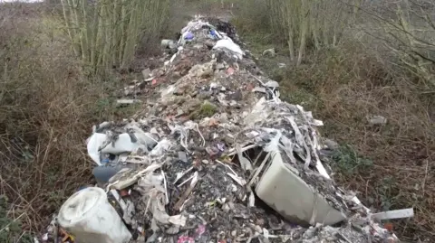 Pile of waste on road