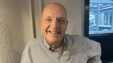 Steve Kirk stood inside the Neptune pub in Derby