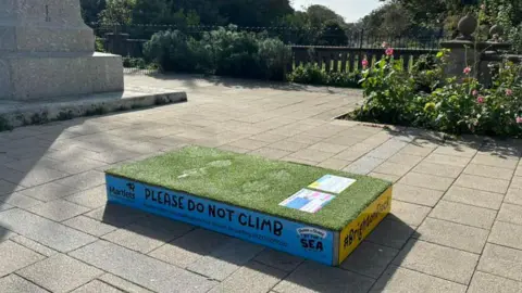 BBC An empty plinth where a statue ought to be