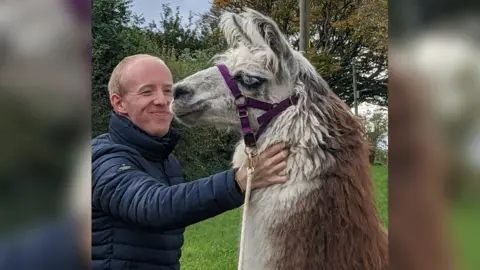Humber Llamas William with a llama